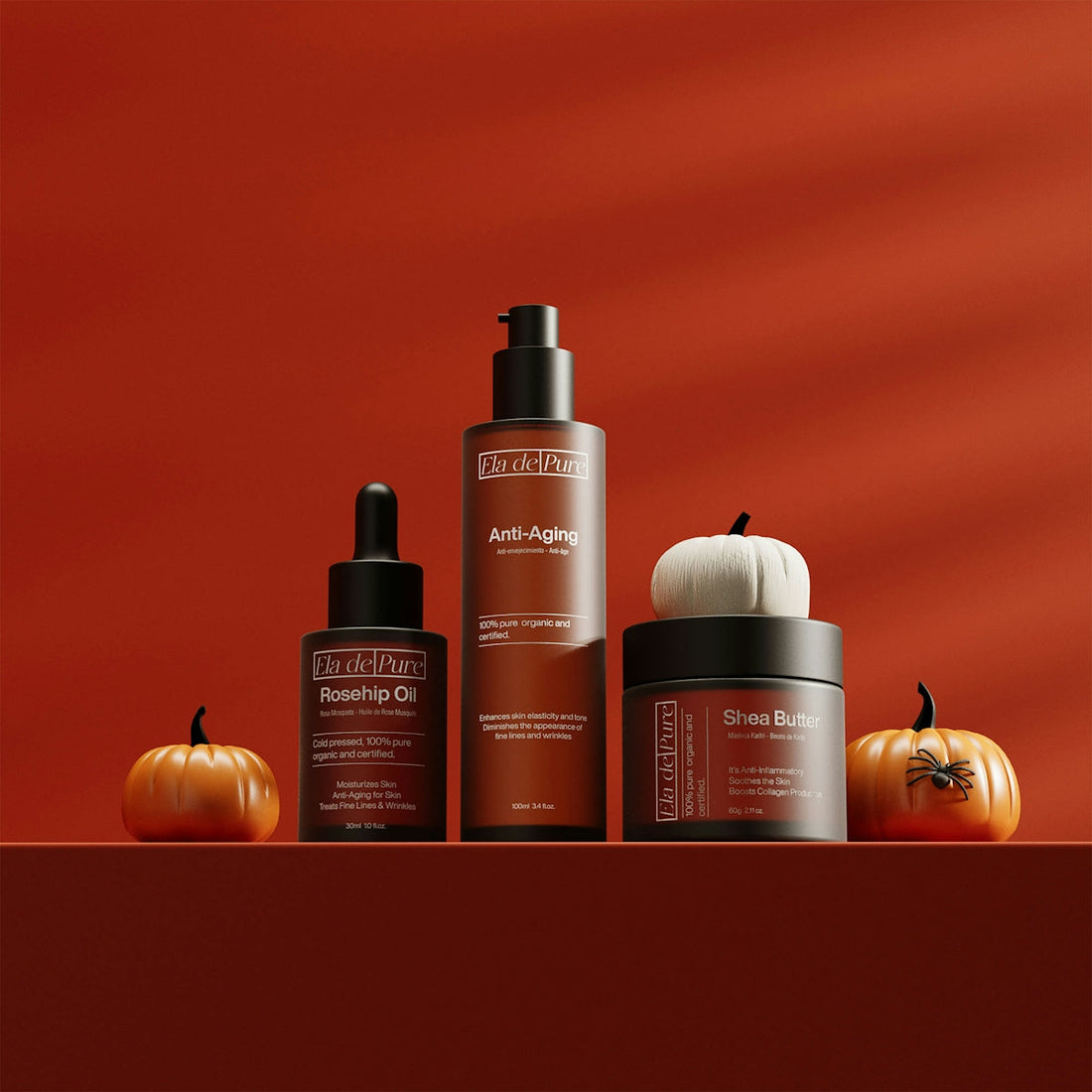 Skincare products displayed with pumpkins for autumn.