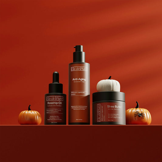 Skincare products displayed with pumpkins for autumn.